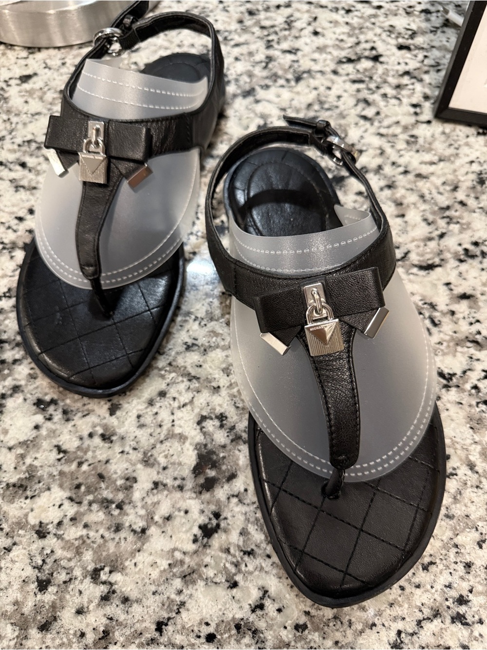 Michael Kors Black Thong Sandals with Silver Hardware